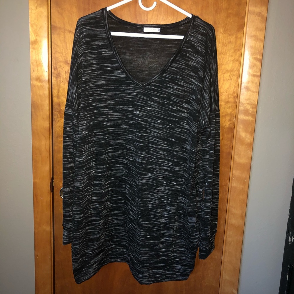 Black long sweater, pockets, side slits
